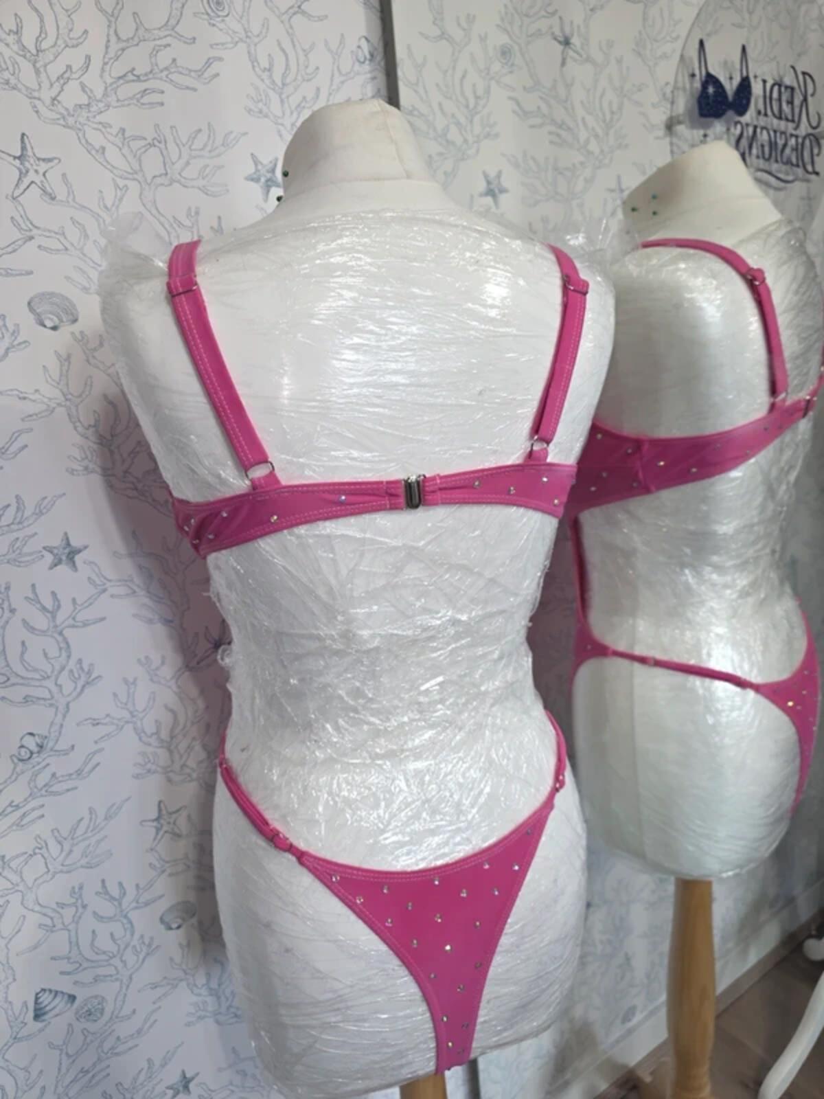 Pink Rhinestoned cut out bodysuit size 12-14